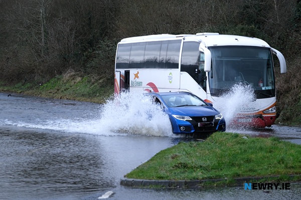 A bus is stuck in flood water on the Fathom line. Photograph: Columba O'Hare/ Newry.ie 
