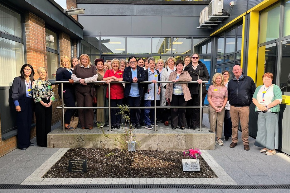 Southern Trust staff, families and visitors are pictured at the new Area of Remembrance which officially opened in Daisy Hill Hospital