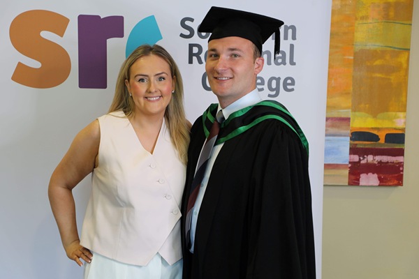 Declan Heaney at his graduation alongside fiancée Orla.  