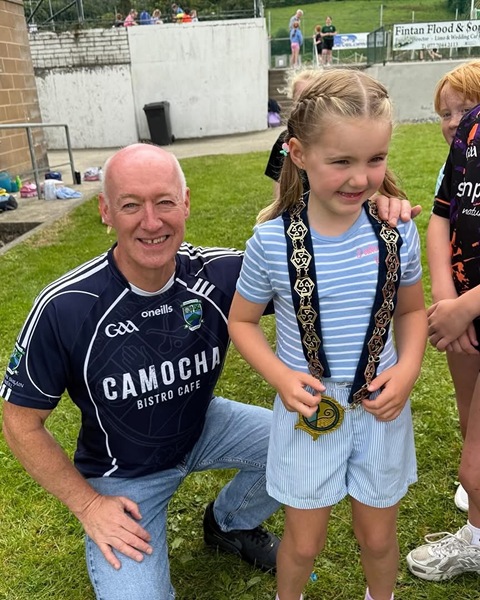 Cllr Declan Murphy with one of the participants in the Children at Shane O'Neill's Summer Camp.