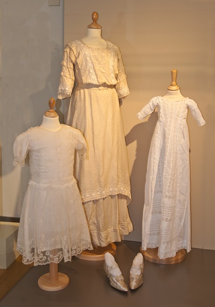 1914 Wedding dress and shoes and early 20th century Christening robe from the 2011 exhibition, ‘Beliefs and Customs through the Ages in Newry and Mourne’.  © Newry and Mourne Museum Collection