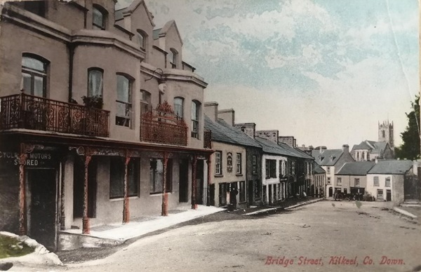 ‘Bridge Street, Kilkeel’ postcard from the Lawrence Series, part of the Hugh Irvine Collection.  On the left is the Royal Hotel.    Newry & Mourne Museum Collection