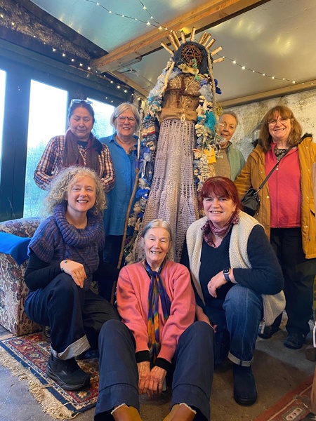 Members of Interwoven with their creation. 