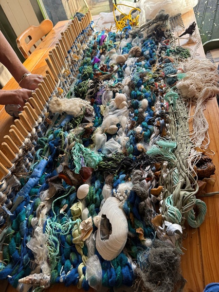 The Brat Bhríde being woven on the table loom. 