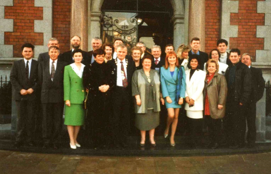 Colour photograph featuring James Savage, Chairman of Newry and Mourne District Council, Mrs. Sadie Cunningham, Chairperson of the Canal Festival 850 Committee, with councillors and committee members, Susan McCann and Rose Marie, to publicise a 'Stars of Newry' night in Newry Town Hall on 1 June 1994. Other performers on the night included Luv Bug, Leon and Springwater, The Hilton Showband with Eleanor Treanor and Pat Jennings. Published in the Newry Reporter 6 January 1994. Newry and Mourne Museum Collection