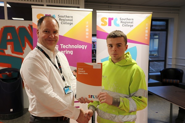 Kyle Harte from Bessbrook who finished in 2nd place in the plastering category at the SkillBuild Intercampus competition.  Kyle is pictured alongside Curriculum Area Manager Gareth Mone.