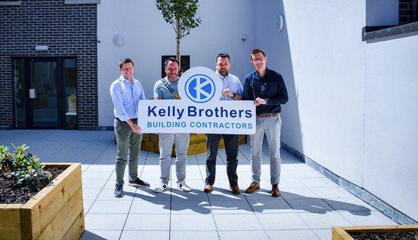 The Managing Director of Kelly Brothers Ronan Kelly, pictured on site at Merchants Quay with Cllr Pete Byrne, Chairperson of Newry, Mourne and Down District Council; Michael Francey, Principal  at MDF Architecture and Sam McKee, Director at Turley.