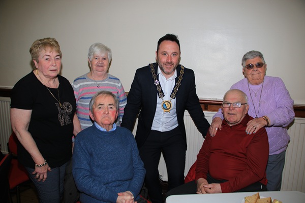 NMDDC Chairperson Councillor Pete Byrne with members of Warrenpoint Friendship Club.