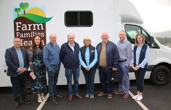 Pictured are from left: Councillor David Taylor, Slieve Gullion DEA Coordinator Aoife McComiskey, Councillor Declan Murphy, John McManus, Farm Families Health Checks Senior Nurse Helen McAuley and Jerome Burns, Councillor Mickey Larkin and Claire Convery Clanrye Group Head of Community partnerships at the DEA Men's Health Event in Slieve Gullion Courtyard.