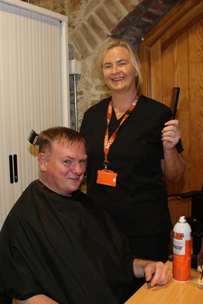 Vincent getting a haircut by Hairdresser Julie from SRC Armagh.