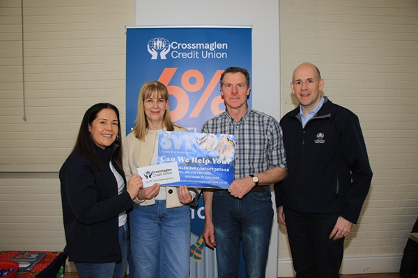 Crossmaglen Credit Union manager Martin Cumiskey (right) and volunteer Ciara Murphy (left) who made a donation to St Vincent De Paul Society representatives Anne Hughes and Peter Duffy.