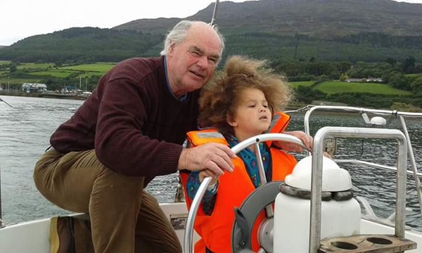 Padhraic Moneley with Granddaughter Phoenix learning how to sail. Carlingford Marina in background.