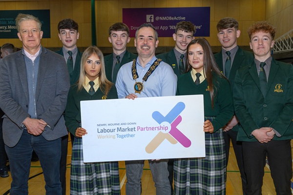 Students from St. Joseph’s HS, Crossmaglen, alongside Newry, Mourne and Down District Council Chairperson Cllr Philip Campbell and Dr. Conor Patterson (left), Chairperson of the NMD Labour Market Partnership