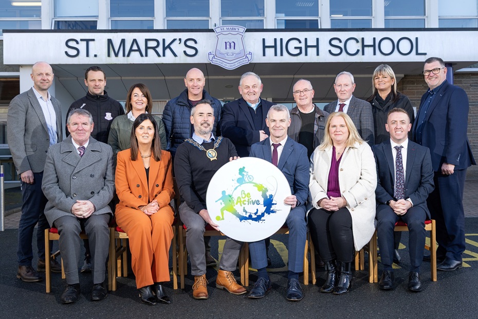 Principal of St. Mark’s High School, Aidan McGivern (centre) with Newry, Mourne and Down District Council Chairperson, Cllr Philip Campbell, Chief Executive, Marie Ward and Chairperson of the Board of Governors, John Allen, alongside members of the school leadership team, Board of Governors, Crotlieve councillors and council officers. 