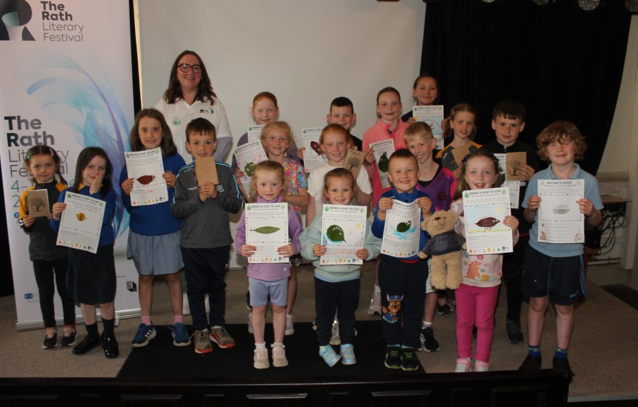 Creative Writing workshop facilitator Arlene Pattison with the children who attended Friday’s free session.