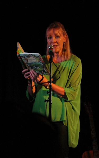 Dechomet's Maggie Doyle reading from her second book, Magy’s Farm - Where Music Grows.  