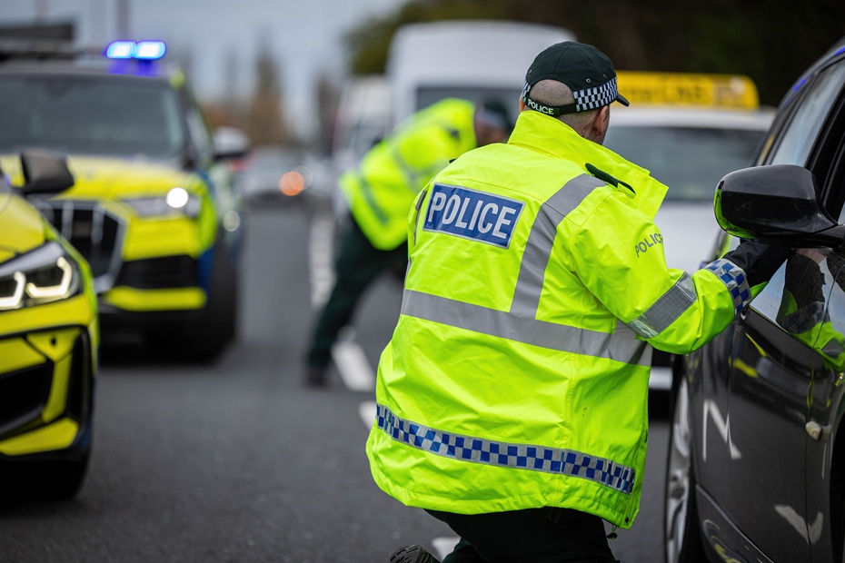 PSNI officers at a vehicle check point.