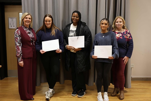 Secondary school pupils placing in the Physical Care of Babies category at the 2026 SRC Schools Partnership Intercampus competition.  They were Beatriz Mane (1st) Craigavon Senior High School, Aine McCamley (2nd) New-Bridge Integrated College, Cara Morgan (3rd), St Marks High School.  Also pictured are SRC Schools Partnership Programme Co-ordinator Liz Quinn and Curriculum Area Manager Anna Martin.