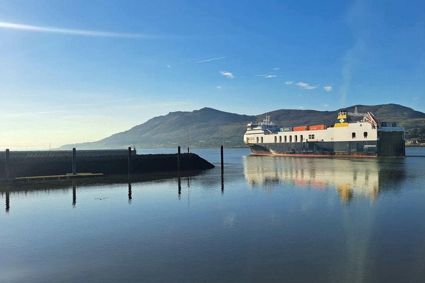 A ship sails out of Warrenpoint Port down Carlingford Lough.