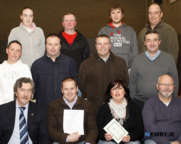 Members of Barcroft Commuity Association at their AGM in 2009. Included are Front from left: Mickey Brady, MLA; Darren Thompson, Chairperson; Martine Marron, Secretary and Sean Maguire, Treasurer; Middle: Melissa Lennon, Sean Kelly, Ewan Morgan and Pat Quinn. Back: Bernice Sheilds, Gerry McAllister, Ryan Quinn and Colin Hanna.