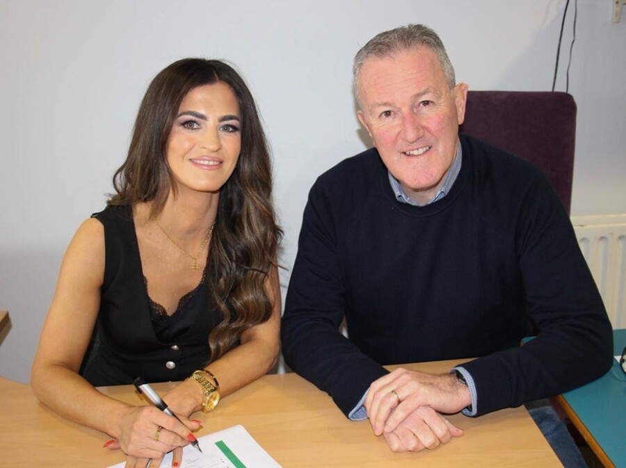 Newry and Armagh MLA Aoife Finnegan signs her nomination papers along with recently elected Seanad Éireann Seanadóir Conor Murphy.