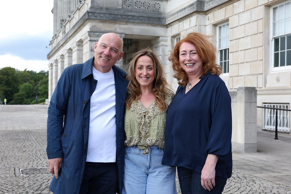 Natalie Cassidy (centre) with Philip McGovern and Jane Kelly, joint CEOs of Big Mountain Productions, during filming for the new series at Parliament Buildings in Belfast 