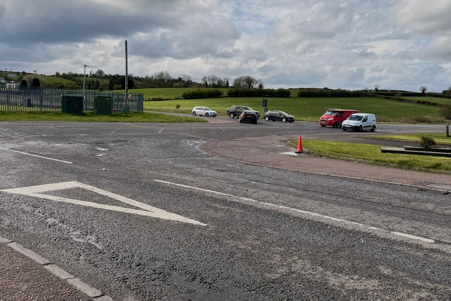 Uneven road surface and a complete lack of road markings at Fords Cross.