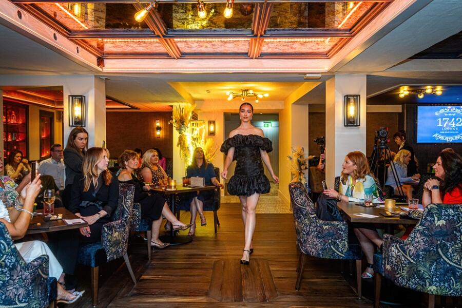 The fashion show gets under way in the 1742 Lounge at the Canal Court Hotel. Photograph: Gorgeous Photography NI