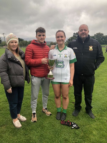 Caoimhe pictured with her family in her playing days for St Mary’s Burren GAA