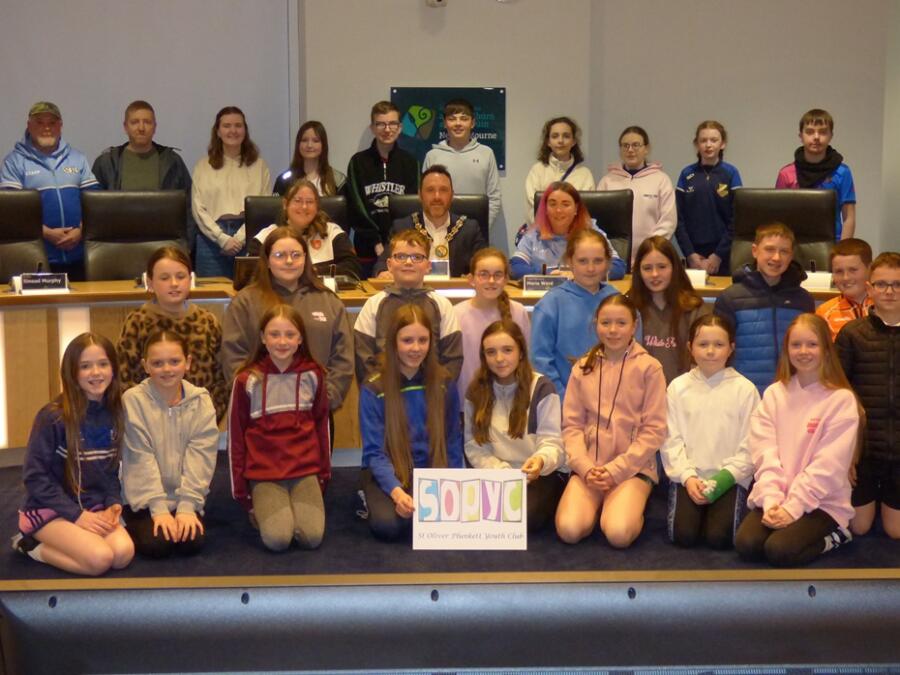 Council Chairperson, Cllr Pete Byrne is photographed with members and leaders from St Oliver Plunkett Youth Club, Crossmaglen, at a special reception at the Downshire Civic Centre.