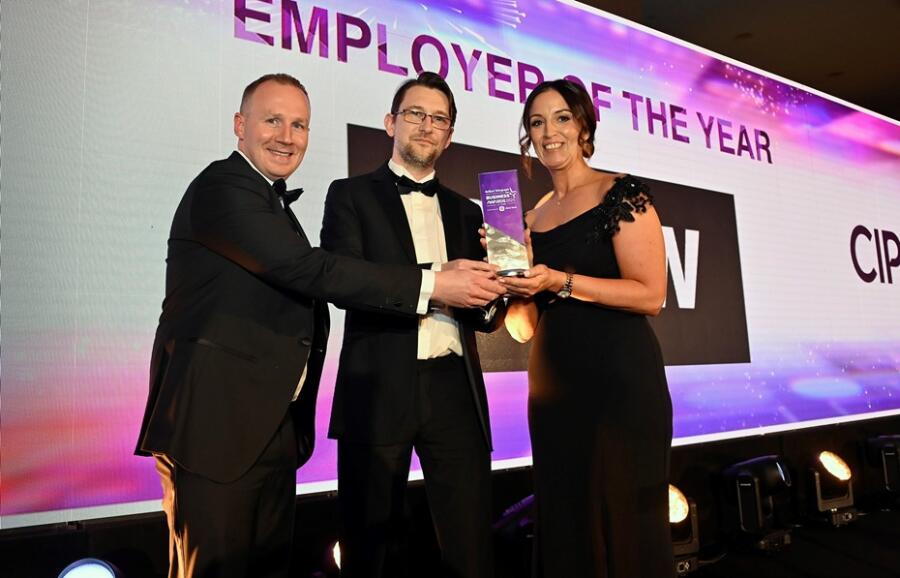 Anthony McVeigh and Laura Cassells from S&W Wholesale were presented with The Employer Of The Year Award by Oli Howard, head of membership and product portfolio at CIPD
