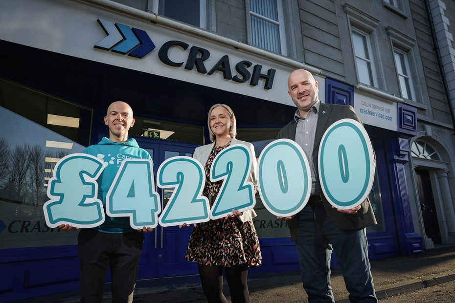 Paula Mahoney, CRASH Services Marketing Director, centre, present a cheque to Eoin Caughey, left, Cancer Focus Corporate Fundraising Officer and Richard Spratt, Cancer Focus Chief Executive.