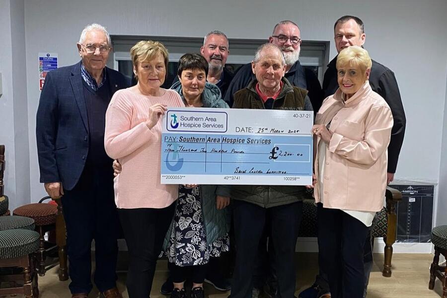 Saval Lourdes Committee members present a cheque for £2,200 to the Southern Area Hospice