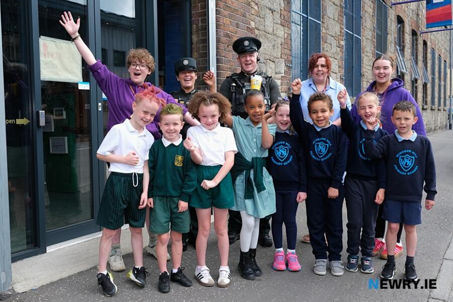 Constable Mary Flanagan and Constable Gavin Grady from the PSNI Neighbourhood Policing Team with Sticky Fingers staff and children from St Patrick's PS and Windsor Hill PS pictured at Sticky Fingers Arts in Newry. Photograph: Columba O'Hare/ Newry.ie 