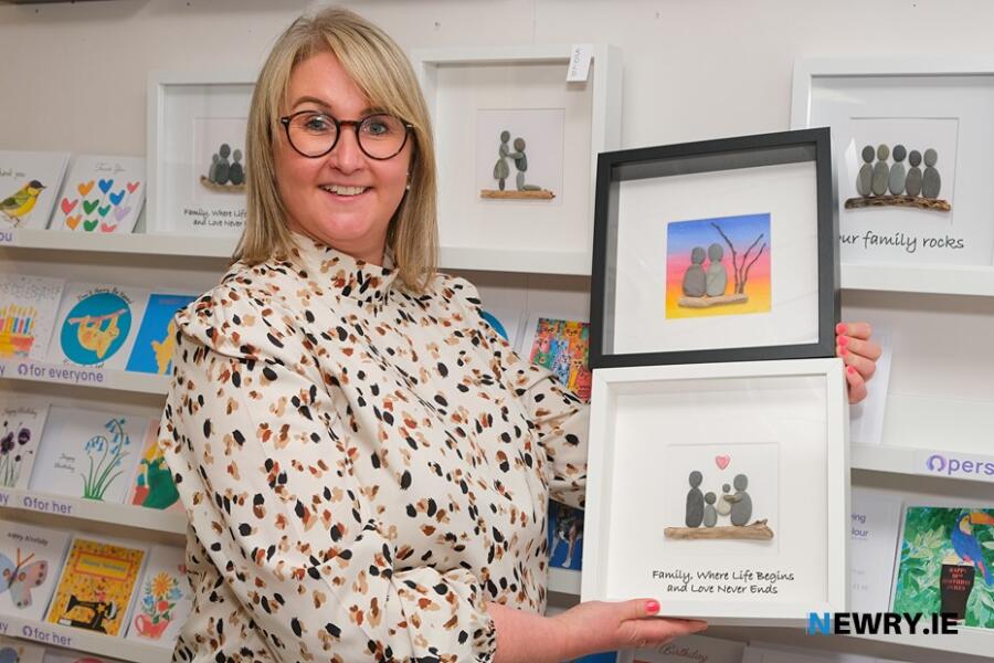 Fiona Murphy with some of her pebble art at the Head Injury Support Social Enterprise Showcase.
