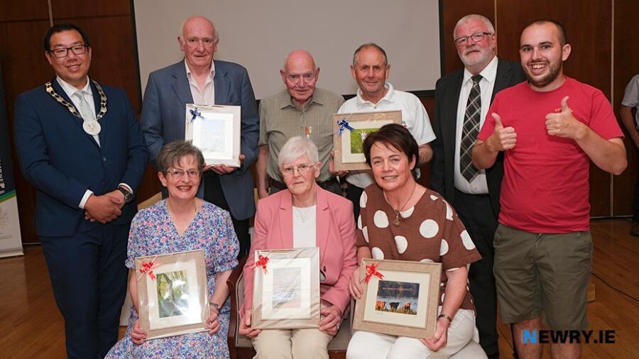 Presentations were made to Newry Show volunteers at their recent press launch. Included front from left: Volunteers Ruth Irvine, Mollie Skillen and Mairead O'Hagan. Back: Cllr David Lee-Surginor, Newry, Mourne and Down District Council; Brendan Durkin, volunteer; Tommy Collins, President, Newry Show; Brian O'Hare, volunteer; Brian Lockhart, Chairman, Newry Show and Nathan Pierson, Nat Photography. Photograph: Columba O'Hare/ Newry.ie 