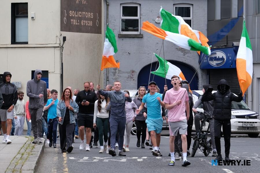 'Newry Says No' protestors walking down Merchants Quay in Newry.