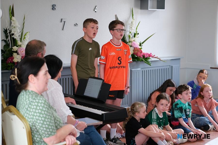 Cousins Darragh Keenan and Niall Kane singing at Avila Nursing Home Bessbrook as part of a Newry Chamber music  event with children from Flynn Performing Arts. Photograph: Columba O'Hare/ Newry.ie  