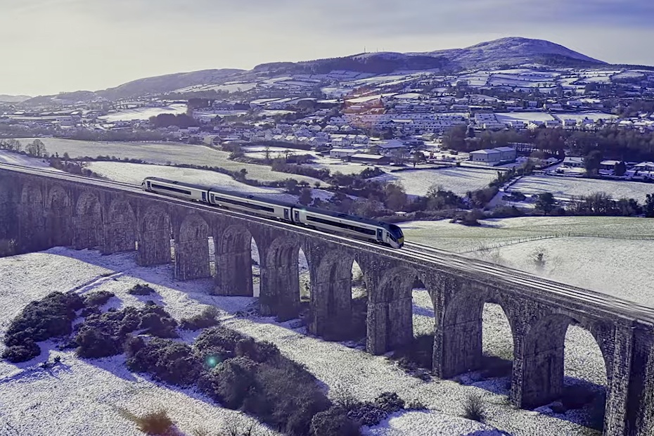 A graphical depiction of the new service crossing over the 18 arches. Image: Iarnrod Eireann/ Translink video still