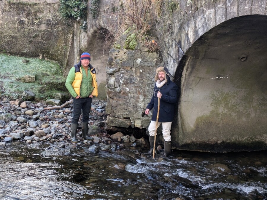 Andrew McMurray MLA and constituent Kieran Sherry at damage to the Fairy Glen bridge in Rostrevor. 
