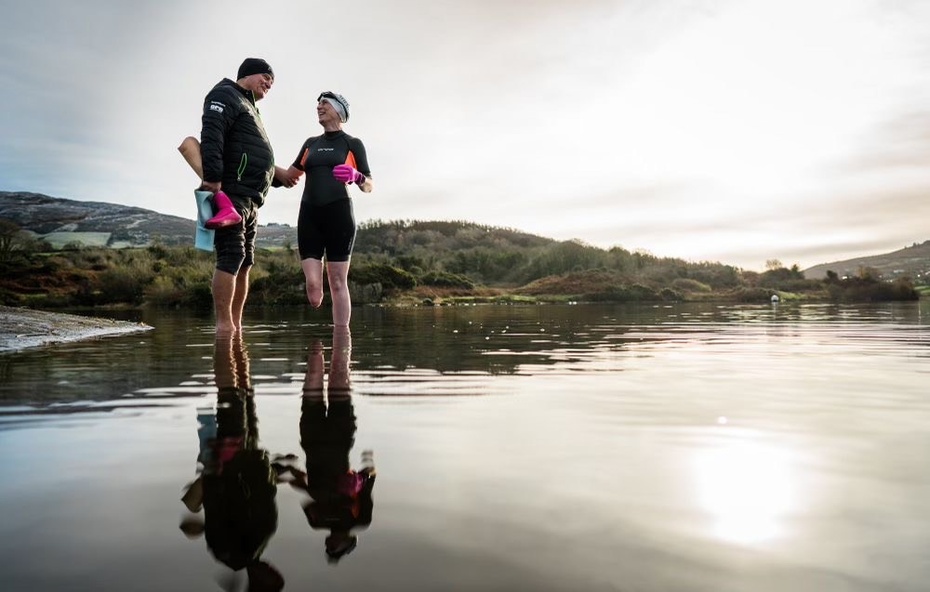 Rosie Tennyson with her swimming trainer and mentor, Milo McCourt at Camlough Lough