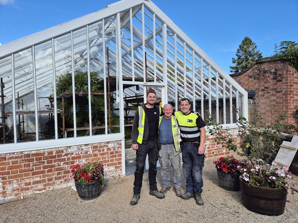 Workers who were involved in the operation to restore the historic glasshouses at Castlewellan Forest Park.