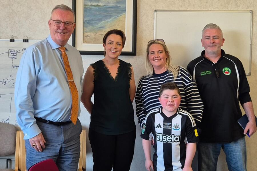 Alfie Pentony and his parents, Colleen and Jamie pictured with Health Minister Mike Nesbitt and Liz Kimmins MLA.