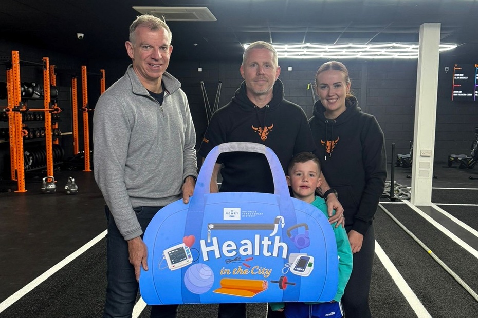 Eamonn Connolly, Newry BID Manager is pictured at the launch of the Family and Business Tryka as part of Health in the City, at No Bull Gym in Newry. Eamonn is pictured with Garry Meehan from No Bull Gym, Garry’s wife Caoimhe from City Sips Café and their nephew Christopher.