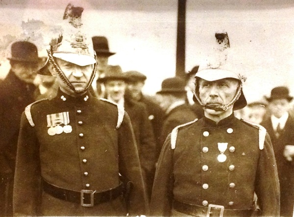 James Heather (right) leaving Buckingham Palace after receiving the Kings Police and Fire Medal (Newry and Mourne Museum Collection)