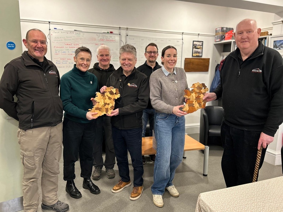 Members of Rostrevor Men's Shed pictured with the visitors