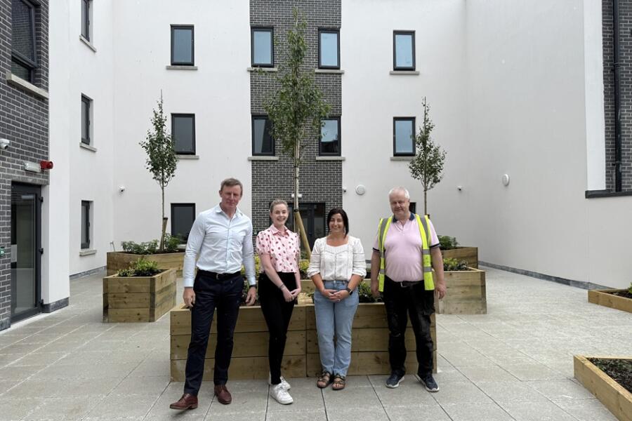 Justin McNulty MLA and Cllr Doire Finn with Leanne Kelly, Director, Kelly Brothers and Micheal Canavan, Project Foreman, Kelly Brothers.