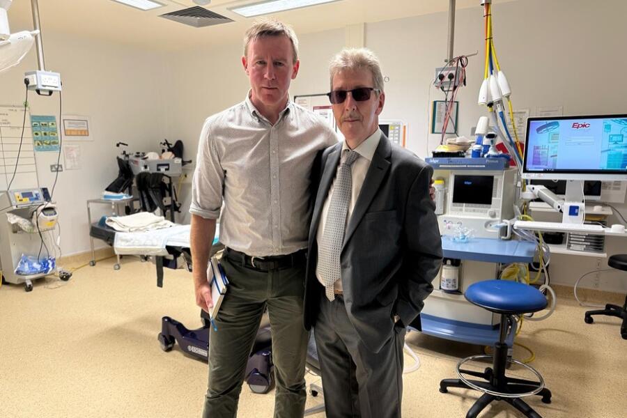 Justin McNulty MLA with Stephen Travers, Miami Showband at Daisy Hill Hospital.