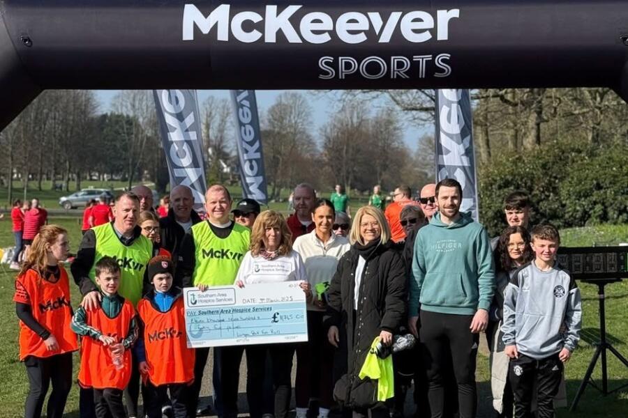 Organisers of the Lurgan Park Fun Run present a cheque to the Southern Area Hospice.