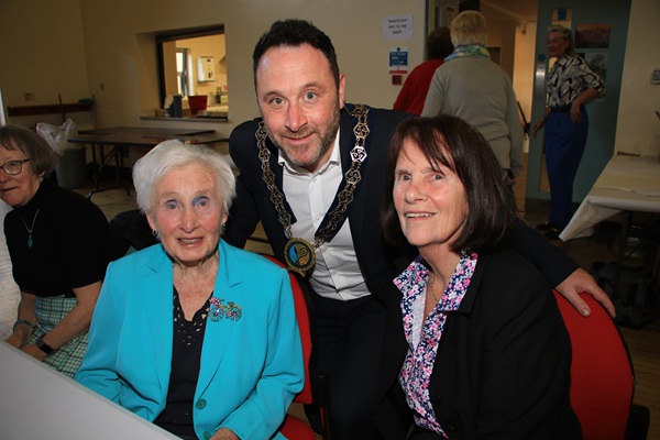 Chairperson Councillor Pete Byrne is photographed with Joan and Pauline who attended the Crotlieve Afternoon Tea Dance.